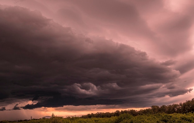 Stormy sky with dramatic clouds at sunset