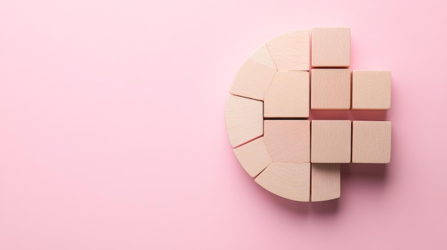 Strategic Market Analysis with Wooden Blocks Circular Graph on Pink Background Business Strategy Concept Flat Lay Composition