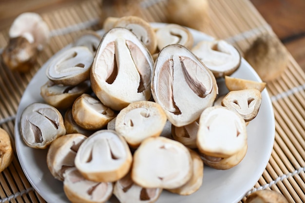 Straw mushrooms on white plate fresh mushrooms slice for cooking food