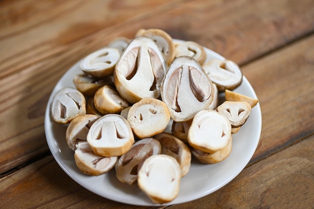 Straw mushrooms on white plate fresh mushrooms slice for cooking food