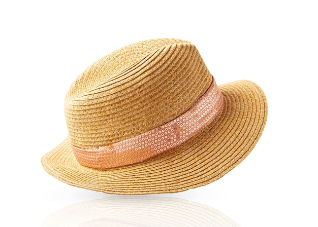 Straw women's hat with a pink ribbon Isolated on a white background