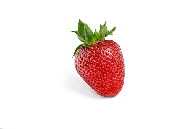 Strawberries isolated Whole strawberries with leaves on a white background