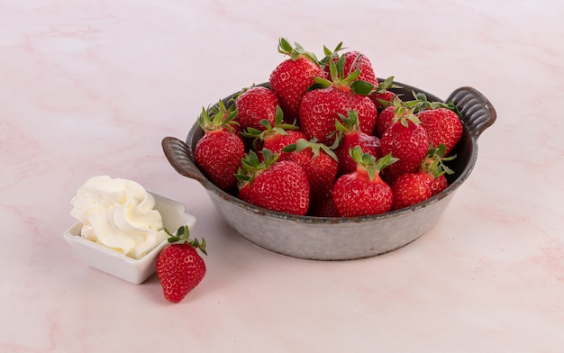 Strawberries in an old grey enamelled dish