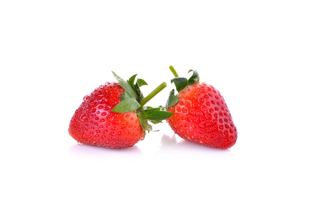 Strawberries on white wall