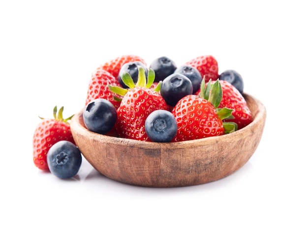 Strawberries with blueberries on white backgrounds