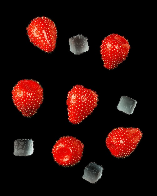 Strawberries with ice isolated on black background