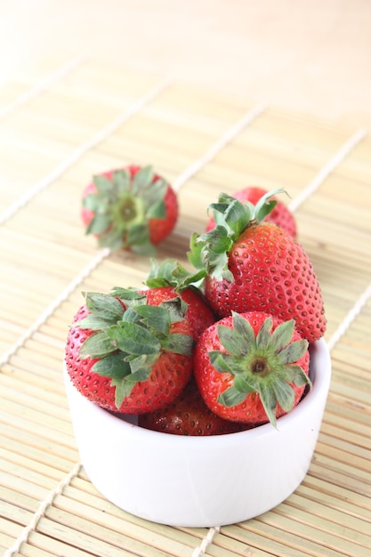 Strawberries on wood background