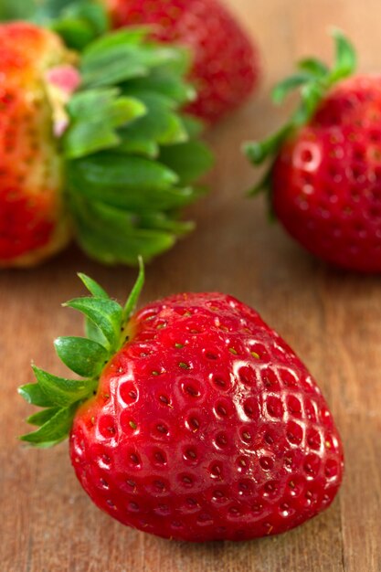 Strawberry on brown old table