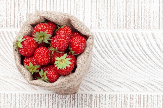 Strawberry in burlap bag