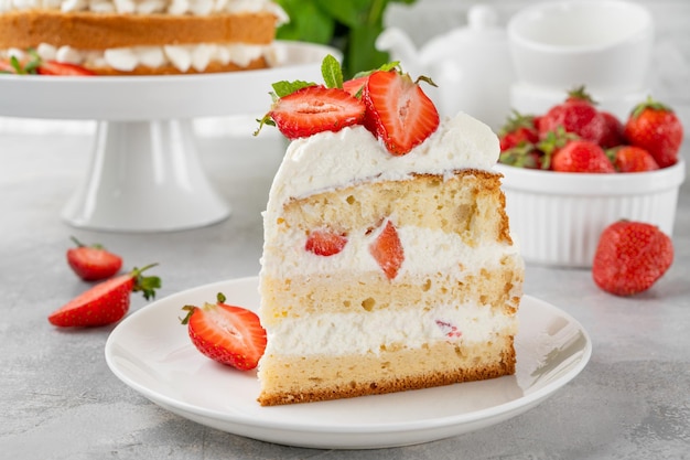 Strawberry cake vanilla sponge cake with cream cheese and strawberries Summer cake Selective focus