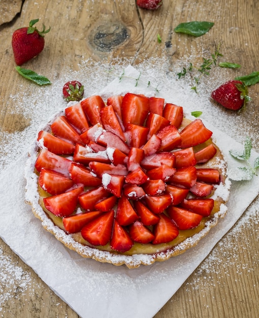 Strawberry cheesecake on a wooden surface