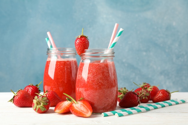 strawberry cocktails on white wooden table