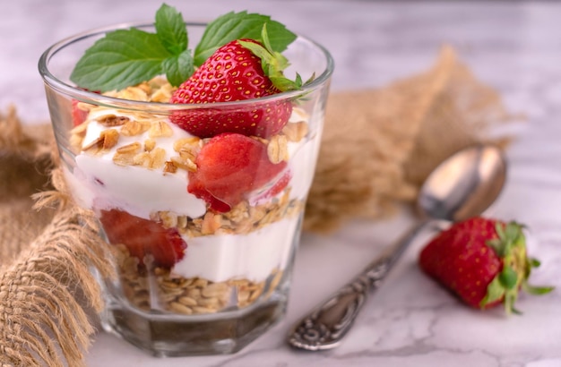 Strawberry dessert with yogurt and muesli