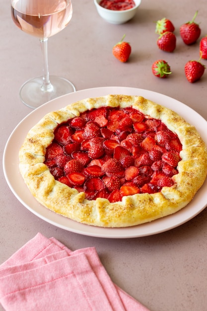 Photo strawberry galette or open pie . baking. vegetarian food.