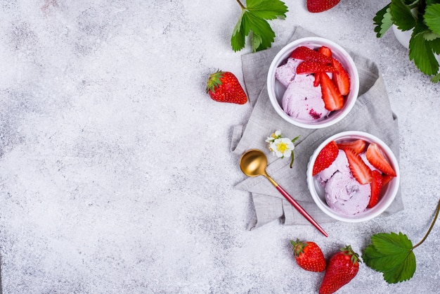 Strawberry ice cream in white bowl