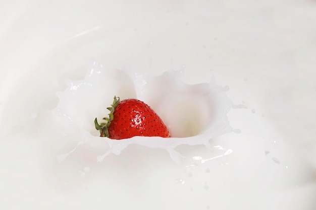 strawberry in milk splash.