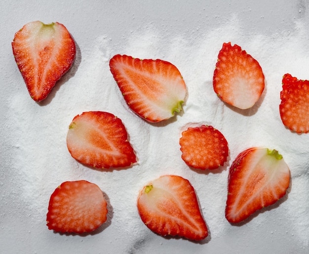 Strawberry protein powder and fresh strawberry fruit on white marble background Top view Flat lay