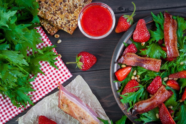 Strawberry salad with arugula, nuts, and honey