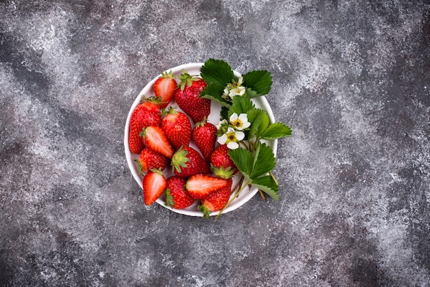 Strawberry with leaves and flowers