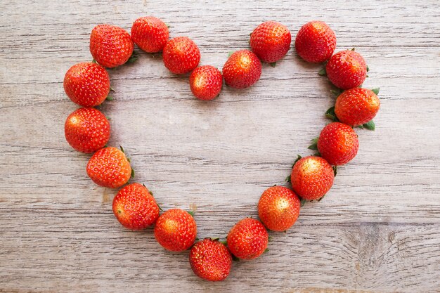 Strawberry on wooden background