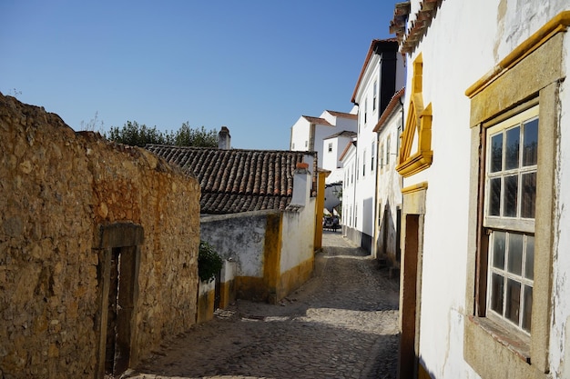 Street amidst buildings against sky