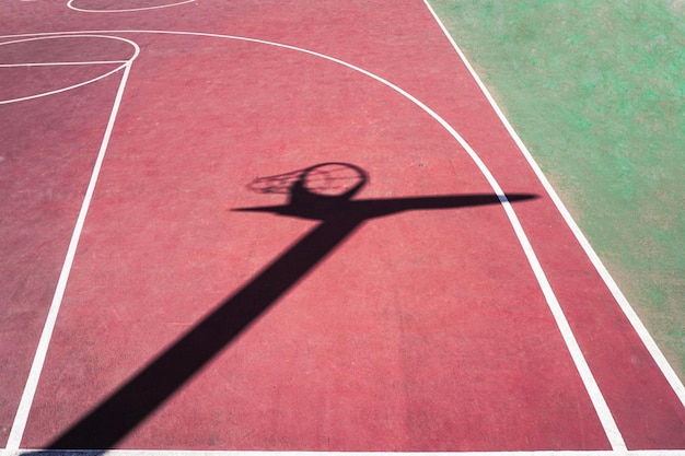 street basket shadow on the sports court