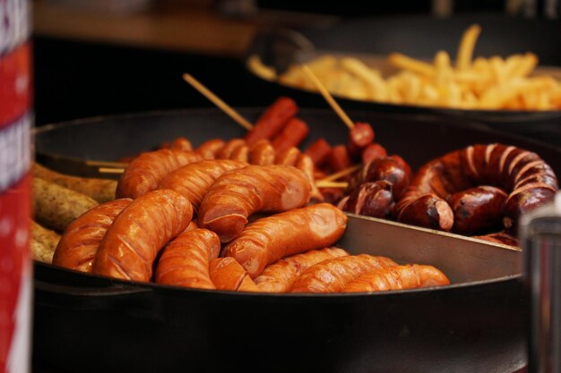 Street food grilled sausages at the christmas market fast food