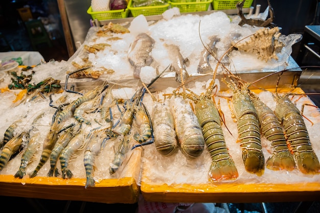 street food at Yaowarat Road, Chinatown, Bangkok and sample delicious street food. There are seafood