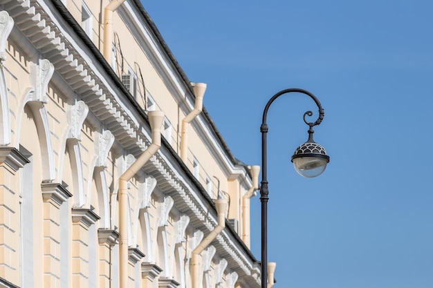 Street lamppost in St Petersburg against the backdrop of a historic building