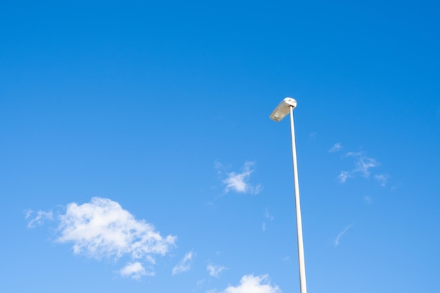 street lantern with blue sky and clouds background