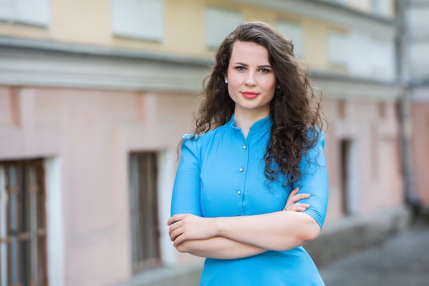 Street photo of a white European girl with a beautiful face.