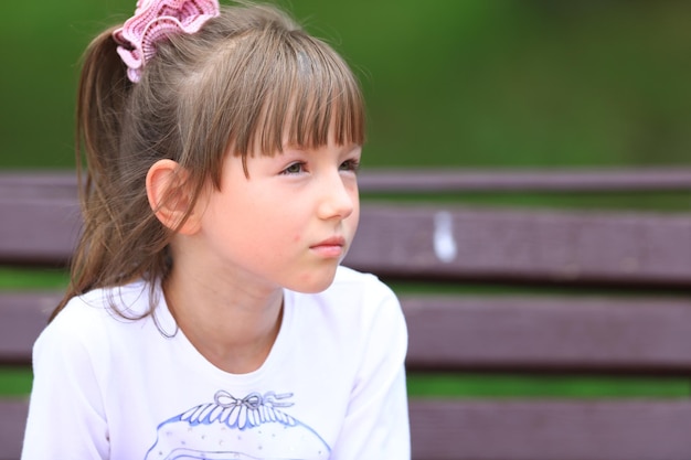 street portrait of a young 7 year old girl