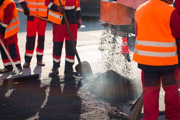 Street resurfacing. Fresh asphalt construction. Bad road