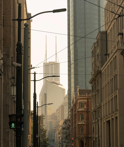 A street scene with a sign that says walk on it