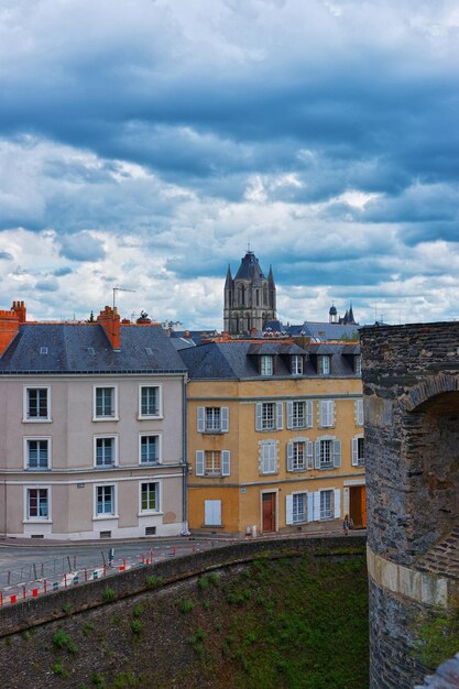 Street top view and tower of Saint Aubin Abbey in Angers in Maine et Loire department of Pays de la Loire region, Loire Valley, in France.