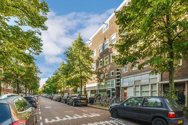 A street with cars parked in front of a building