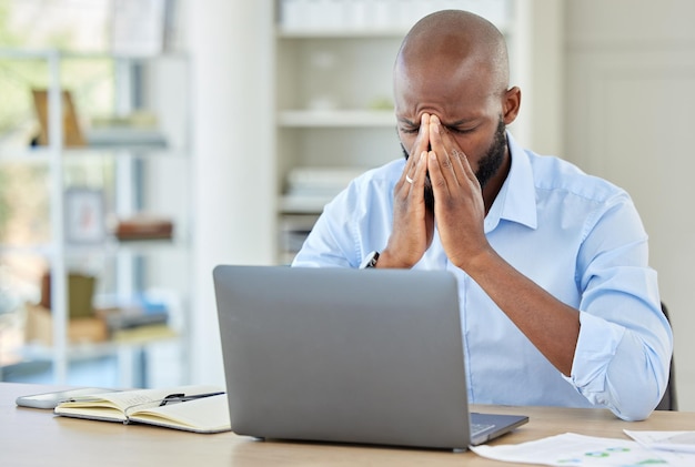 Stress burnout and depression businessman with laptop in office with depression anxiety and 404 computer glitch Headache mental health and frustrated employee with audit tax and work overload