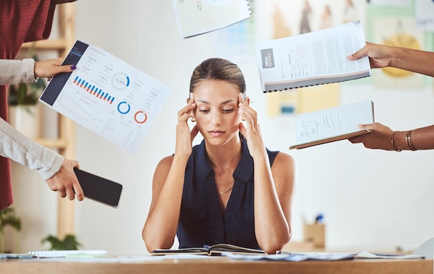 Stress headache and burnout with business woman feeling overwhelmed by a busy schedule and deadline in an office Corporate employee suffering anxiety and mental breakdown from workload and tasks