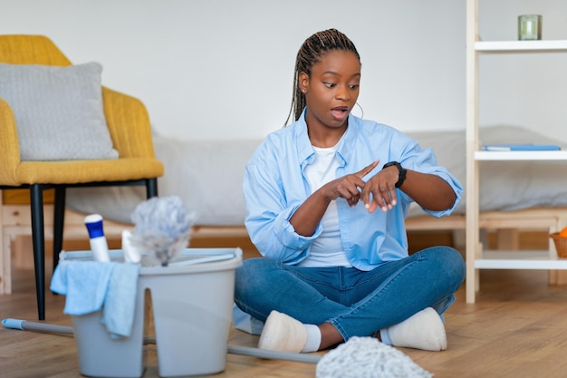 Stressed african american lady have no time for chores