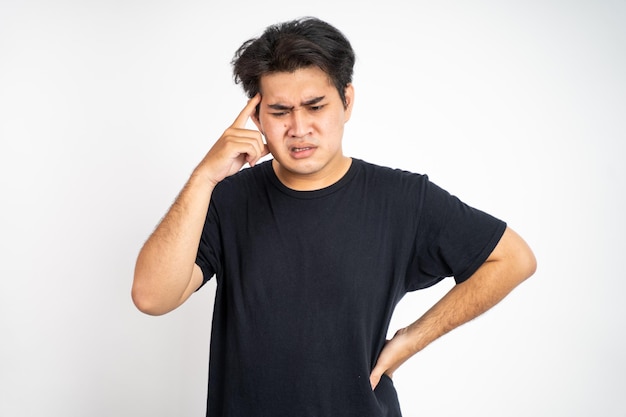 Stressed asian young man feeling unsure about life