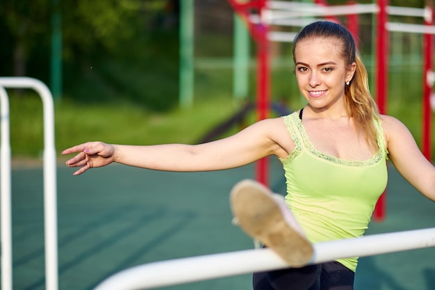 Stretching fit or dancer woman doing exercise in workout sports ground