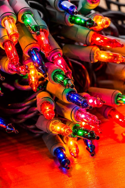 String of multicolor Christmas lights with green wiring.