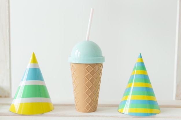 Striped colourful cones hats. Birthday holiday party concept.