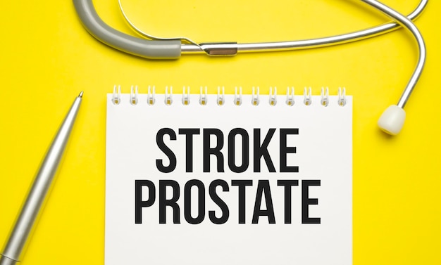 Stroke PROSTATE text on the notebook next to it is a stethoscope