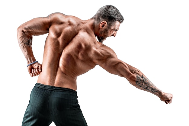 Strong athletic man fitness model posing back muscles triceps over white background