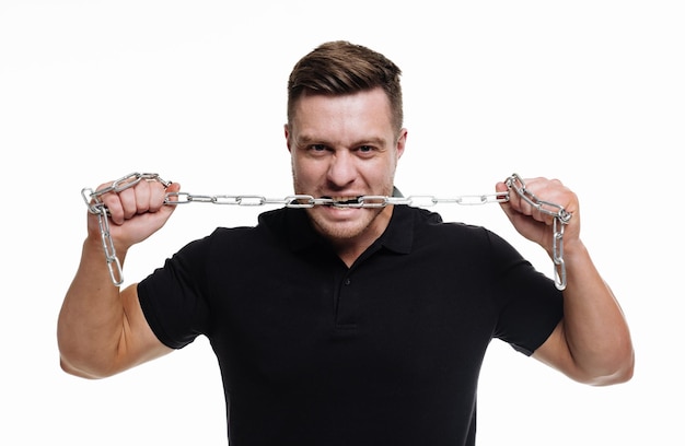 Strong teeth with chains portrait Angry person with perfect dentistry teeth