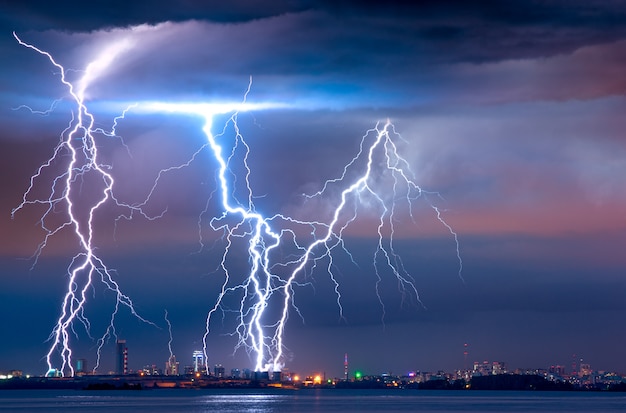 Strong thunderstorm with lightning over the city