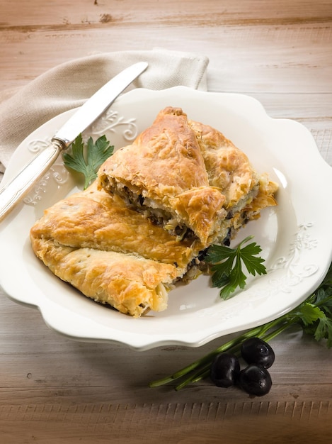 Strudel stuffed with tuna and black olives