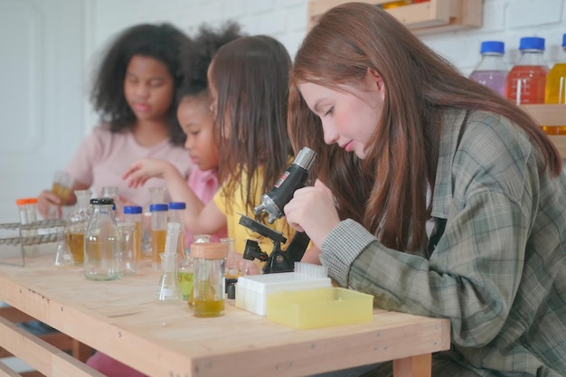 Student in classroom young girl happy funny study and play with experimenting in class