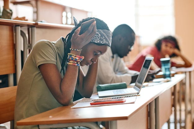 Student doing test at auditorium